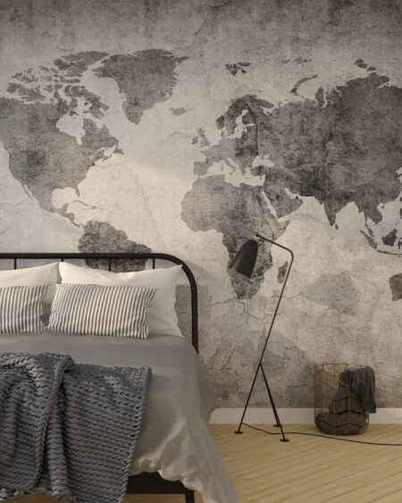 Сучасні фотошпалери карта світу у стилі чорної акварелі на текстурі сірої потрісканої стіни в спальні
